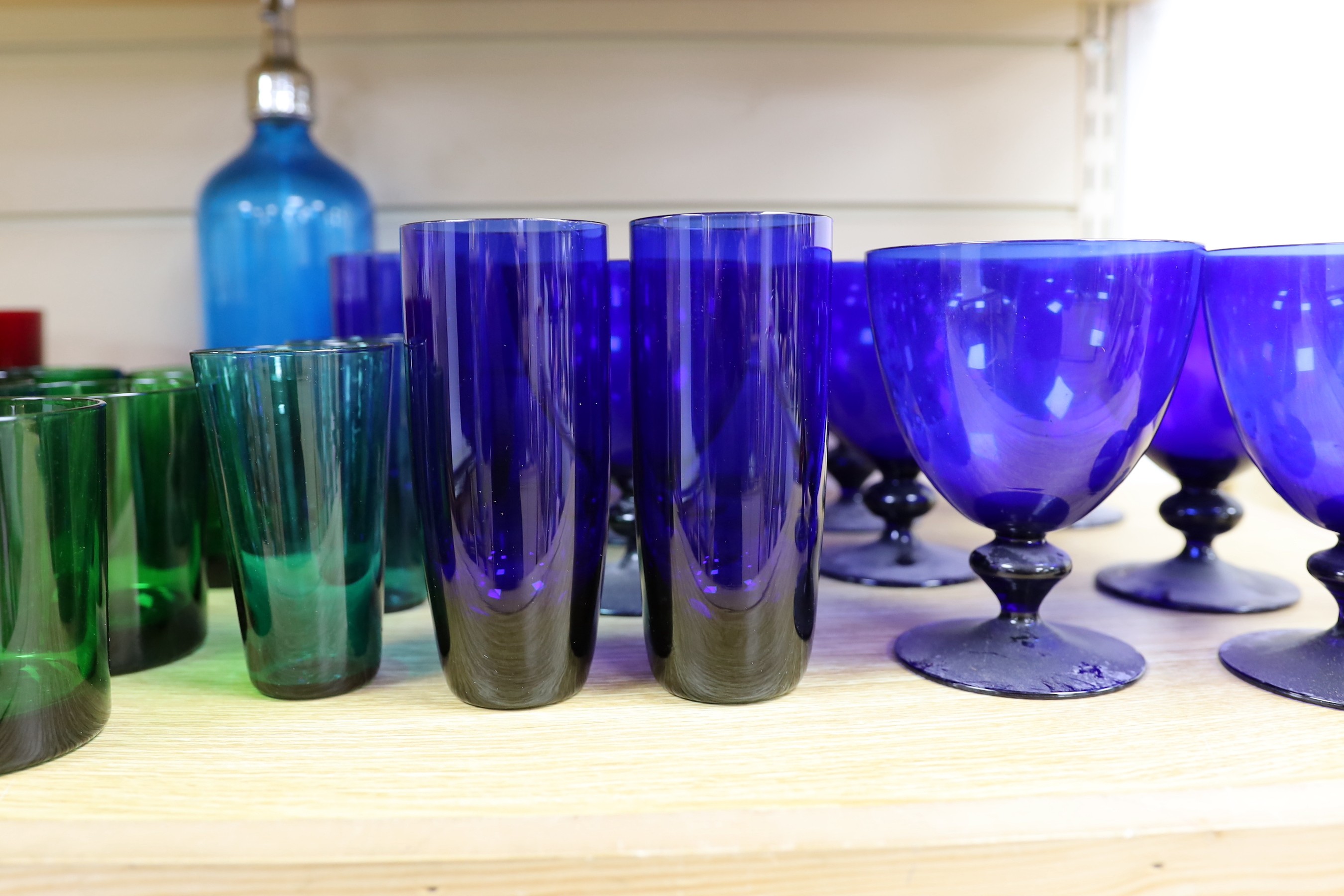 A mixed selection coloured glass wares